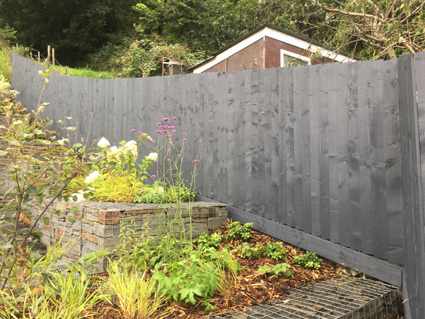 Feather edge timber fence painted with Cuprinol Garden Shades Urban Slate